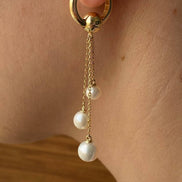 Small Cyclic Natural Pearl Dangling Earring