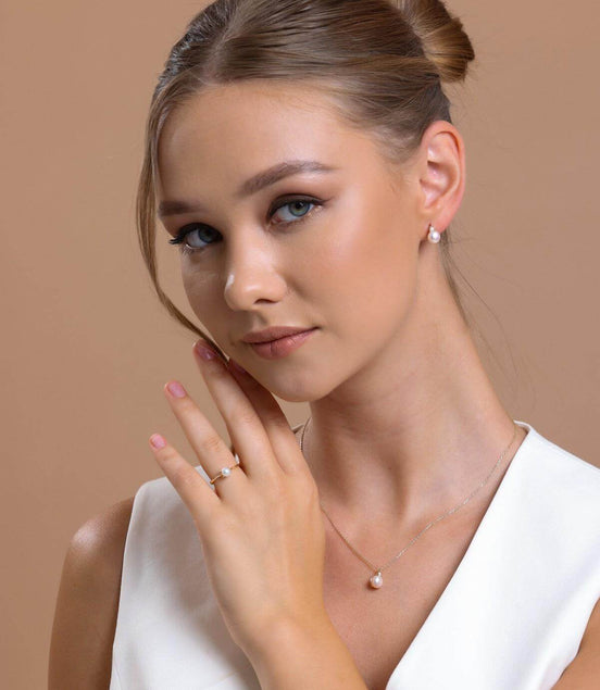 Doğal İncili 0,12 Karat Pırlantalı Küpe | | Birinci1926